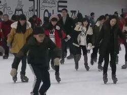 Shot of People skating at Seoul City hall plaza Stock Footage