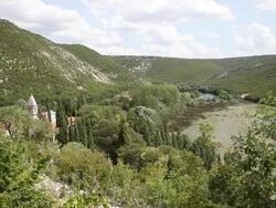 Krka river and the monastery of the Holy Archangel, Carigradska draga, Krka National Park  Stock Footage