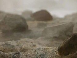 MS Rocks sitting surrounded by rising steam in Krysuvik Geothermal area / Reykjanes peninsula, Iceland       Stock Footage