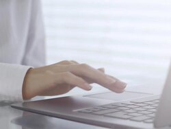 Using Laptop Touchpad Stock Footage