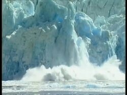 MS Sheet of ice from glacier collapsing into sea, Arctic circle Stock Footage