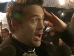 INTERVIEW: Robert Downey Jr  on the possibilities of his character having a love interest in the 3rd film at the Sherlock Holmes: A Game Of Shadows: European Premiere at Empire Leicester Square on December 08, 2011 in London, England Stock Footage