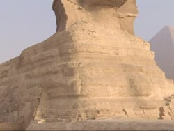 The Great Sphinx sits in front of the Great Pyramids. Stock Footage