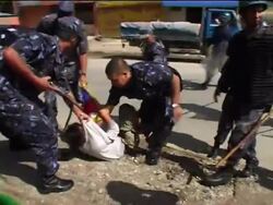 Police detain Tibetans protesting in front of visiting Chinese officials News Clip