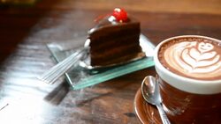HD:Coffee art with chocolate cake Stock Footage