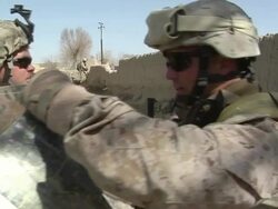 MS ZI TU TD PAN  Soldiers examining map / Musa Qala, Helmand Province, Afghanistan.  Stock Footage