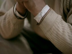 Real people from rural India: Mature man sitting near bonfire Stock Footage