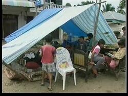INDONESIA: EARTHQUAKE KILLS 103 UPDATE News Clip