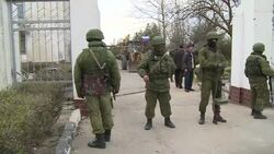 CLEAN : Russian forces take over Crimean military News Clip