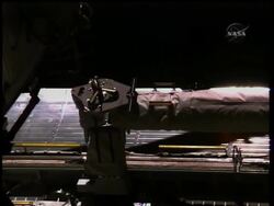 Astronauts will use the shuttle's robot arm to inspect the gash in the Endeavor's heat shild. Instructional Video