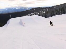 A man skiing down a snow-covered mountain in the winter. - Slow Motion Stock Footage