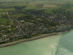 AERIAL, Town along coastline, Ault, Picardie, France Stock Footage