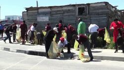 Desmond Tutu celebrates his 82nd birthday by picking up litter News Clip