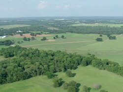 WS AERIAL View of Crossing the Red River into Texas / Texas, United States Stock Footage