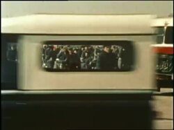 Traffic and pedestrians pass Tiananmen Gate and Tiananmen Square in Beijing, China. News Clip