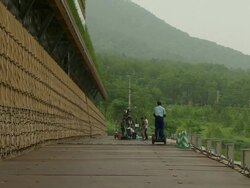 WS Shot of television news crews preparating for G8 meeting outside / Hokkaido Toyako, Japan Stock Footage