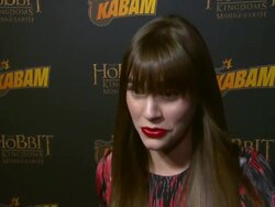INTERVIEW - Christa B. Allen on if she's a Hobbit fan at "The Hobbit: The Desolation Of Smaug Expansion Pack" Hits The Red Carpet Stock Footage