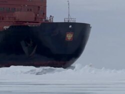 MS, Russian nuclear icebreaker traveling through frozen sea Russia Stock Footage