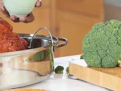 ECU PAN Senior Couple Cooking Turkey for Holiday Dinner / Richmond, Virginia, USA Stock Footage