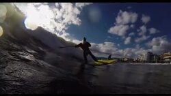CLEAN : Santa Klaus surfing near Genoa News Clip