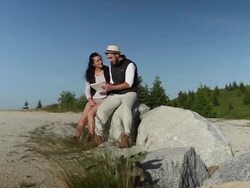 Couple hiking looking at view Stock Footage