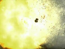 Giant meteorite impact on the Moon, forming an impact basin. Some impact basins were subsequently filled by volcanic dark lava eruptions, which formed the dark lunar seas visible today.. Stock Footage