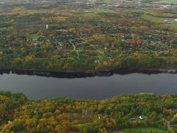 WS ARIEAL View of River at Bangor / Maine, United States Stock Footage