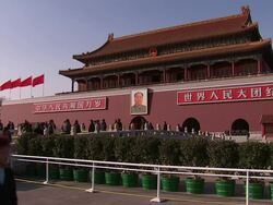Tourists in Tiananmen Square on NPC opening day News Clip