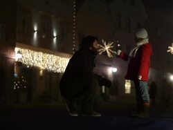 Father And Daughter Lighting A Sparkler Stock Footage