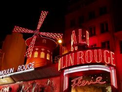 Moulin Rouge at night, Paris, France Stock Footage