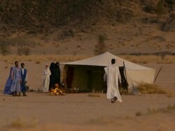 Man saying hello to people at mauritanian tent Stock Footage