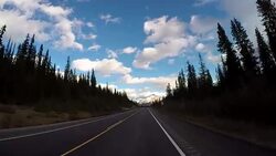 Car driving on Icefields parkway scenic road Stock Footage