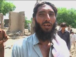 Residents flee destroyed village, US aid; aerials News Clip