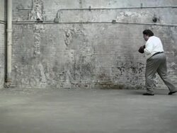 Overweight businessman practicing boxing, fade in and out Stock Footage