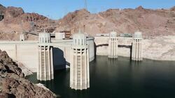 Intake towers for the Hoover Dam hydro electric power station, Lake Mead, Nevada, USA. The lake is at exceptionally low levels following the four year long drought. Stock Footage