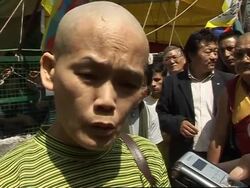 WRAP Pro-Tibet protests; monks hold prayers; head shaving in Dharmsala News Clip