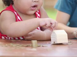 Cute boy with mother learn to count money Stock Footage