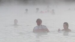 People Swimming in the Blue Lagoon, Iceland News Clip