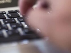 Hand typing a laptop computer Stock Footage