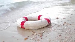 HD Dolly:Lifebuoy on the beach. Stock Footage