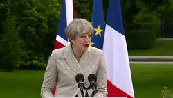 UK Prime Minister Theresa May and French President Emmanuel Macron Press Conference in Paris News Clip