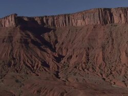 Wide Shot aerial - Steep cliffs rise above a desert / Grand Canyon, USA Stock Footage