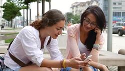 Browsing and texting on a smart phone Stock Footage