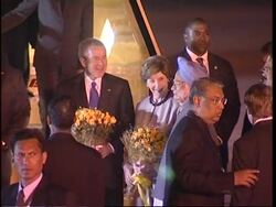 Bush arrives for visit; anti-Bush protest News Clip