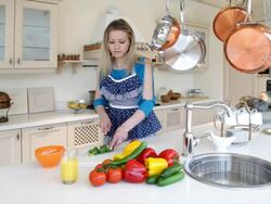 Woman in the kitchen Stock Footage