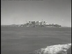 A boat creates a wake in San Francisco Bay near Alcatraz Island. News Clip