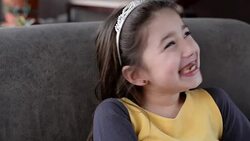 Girl eating chocolate Stock Footage