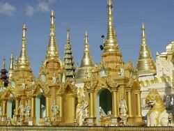 WS Shot of filigree golden pagoda peaks and shrines with nat figures in shwedagon pagoda / Yangon, Yangon Division, Myanmar Stock Footage