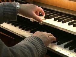 MS Organist at church organ playing / Saarburg, Rhineland-Palatinate, Germany Stock Footage
