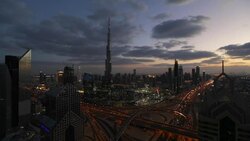 The Burj Khalifa Dubai, elevated view across Sheikh Zayed Road and Financial Centre Road Interchange, Downtown Dubai, Dubai, UAE Stock Footage